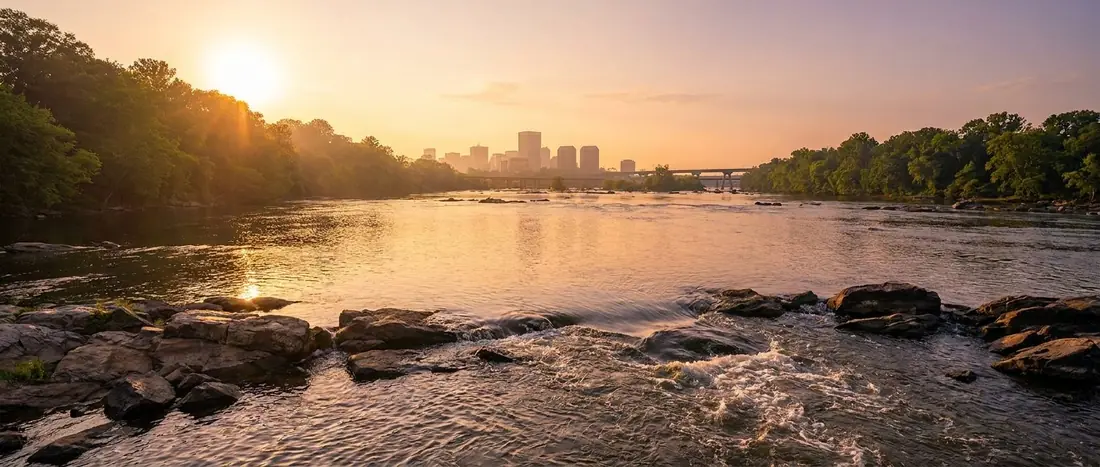 Illustration: the James River in Richmond at sunset with the city skyline in the distance